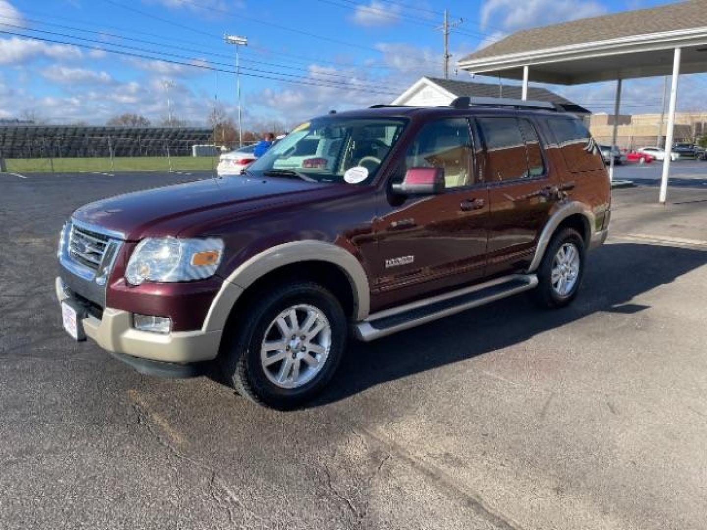 2007 Dark Cherry Metallic Ford Explorer Eddie Bauer 4.0L 4WD (1FMEU74E77U) with an 4.0L V6 SOHC 16V engine, 5-Speed Automatic transmission, located at 4508 South Dixie Dr, Moraine, OH, 45439, (937) 908-9800, 39.689976, -84.218452 - Photo#1