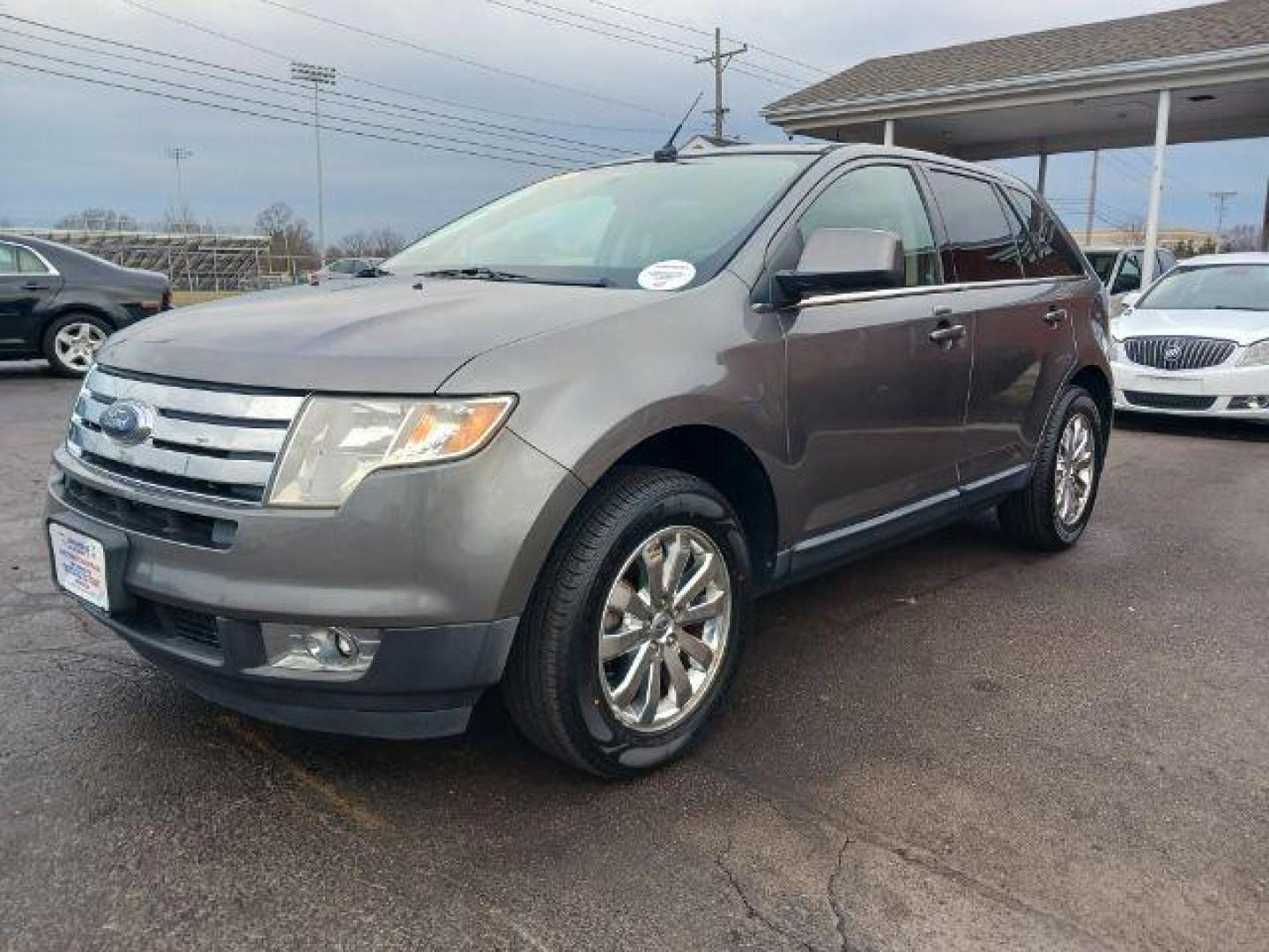 2009 Sterling Grey Metallic Ford Edge Limited FWD (2FMDK39C79B) with an 3.5L V6 DOHC 24V engine, 6-Speed Automatic transmission, located at 4508 South Dixie Dr, Moraine, OH, 45439, (937) 908-9800, 39.689976, -84.218452 - Photo#2