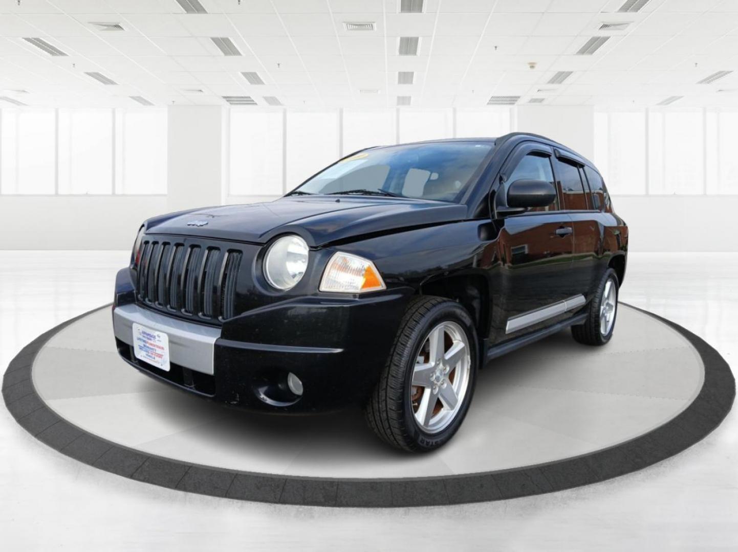 2009 Brilliant Black Crystal Pearlcoat Jeep Compass Limited 4WD (1J4FF57B79D) with an 2.4L L4 DOHC 16V engine, located at 1951 S Dayton Lakeview Rd., New Carlisle, OH, 45344, (937) 908-9800, 39.890999, -84.050255 - Photo#7