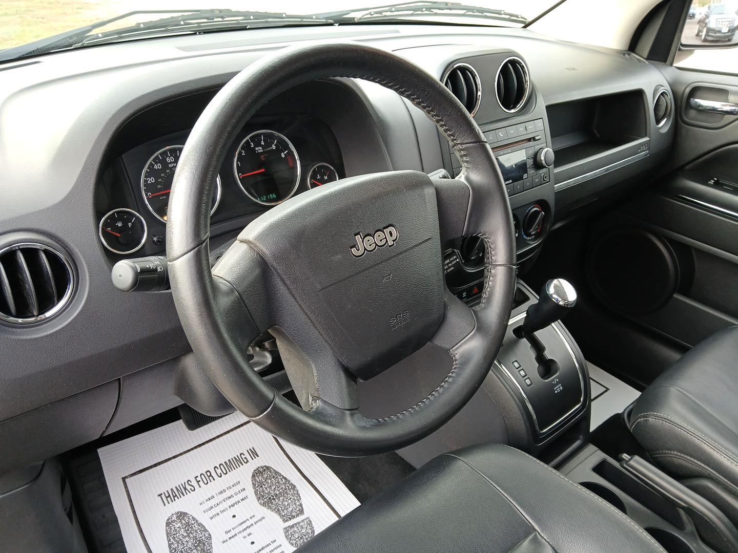 2009 Brilliant Black Crystal Pearlcoat Jeep Compass Limited 4WD (1J4FF57B79D) with an 2.4L L4 DOHC 16V engine, located at 1951 S Dayton Lakeview Rd., New Carlisle, OH, 45344, (937) 908-9800, 39.890999, -84.050255 - Photo#8