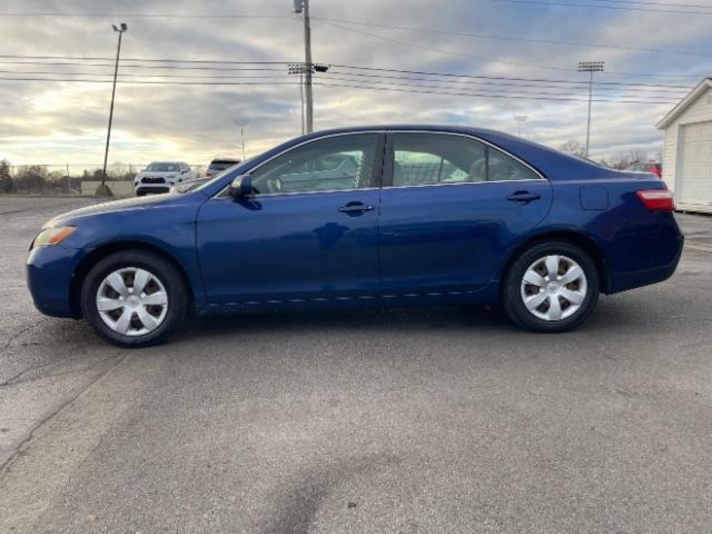 2009 Blue Ribbon Metallic Toyota Camry LE 5-Spd AT (4T4BE46K49R) with an 2.4L L4 DOHC 16V engine, 5-Speed Automatic transmission, located at 1951 S Dayton Lakeview Rd., New Carlisle, OH, 45344, (937) 908-9800, 39.890999, -84.050255 - 2009 Toyota Camry LE 5-Spd AT - Photo#22