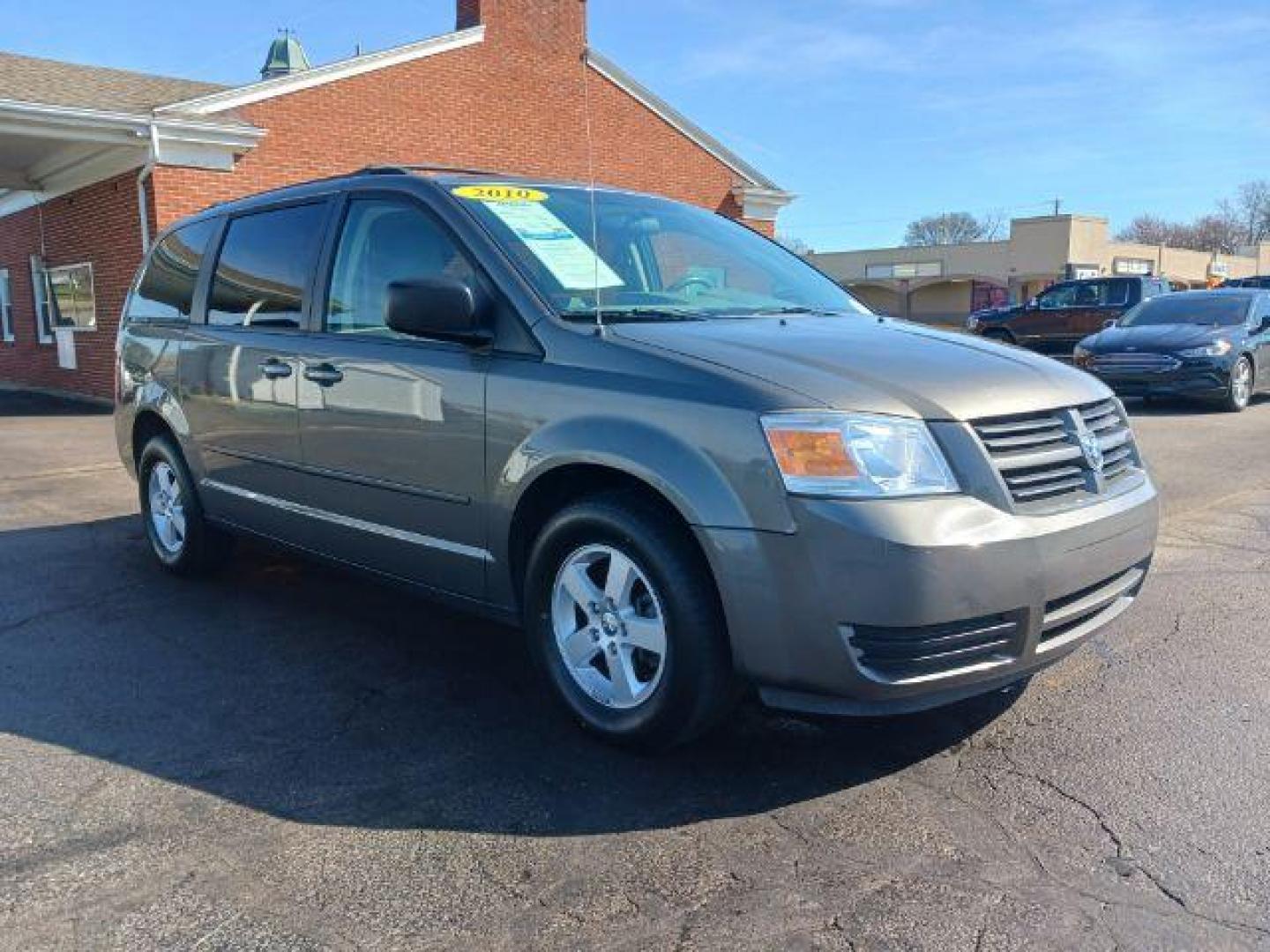 2010 Dark Cordovan Pearl Dodge Grand Caravan Hero (2D4RN3D16AR) with an 3.8L V6 OHV 12V engine, 6-Speed Automatic transmission, located at 4508 South Dixie Dr, Moraine, OH, 45439, (937) 908-9800, 39.689976, -84.218452 - Photo#0