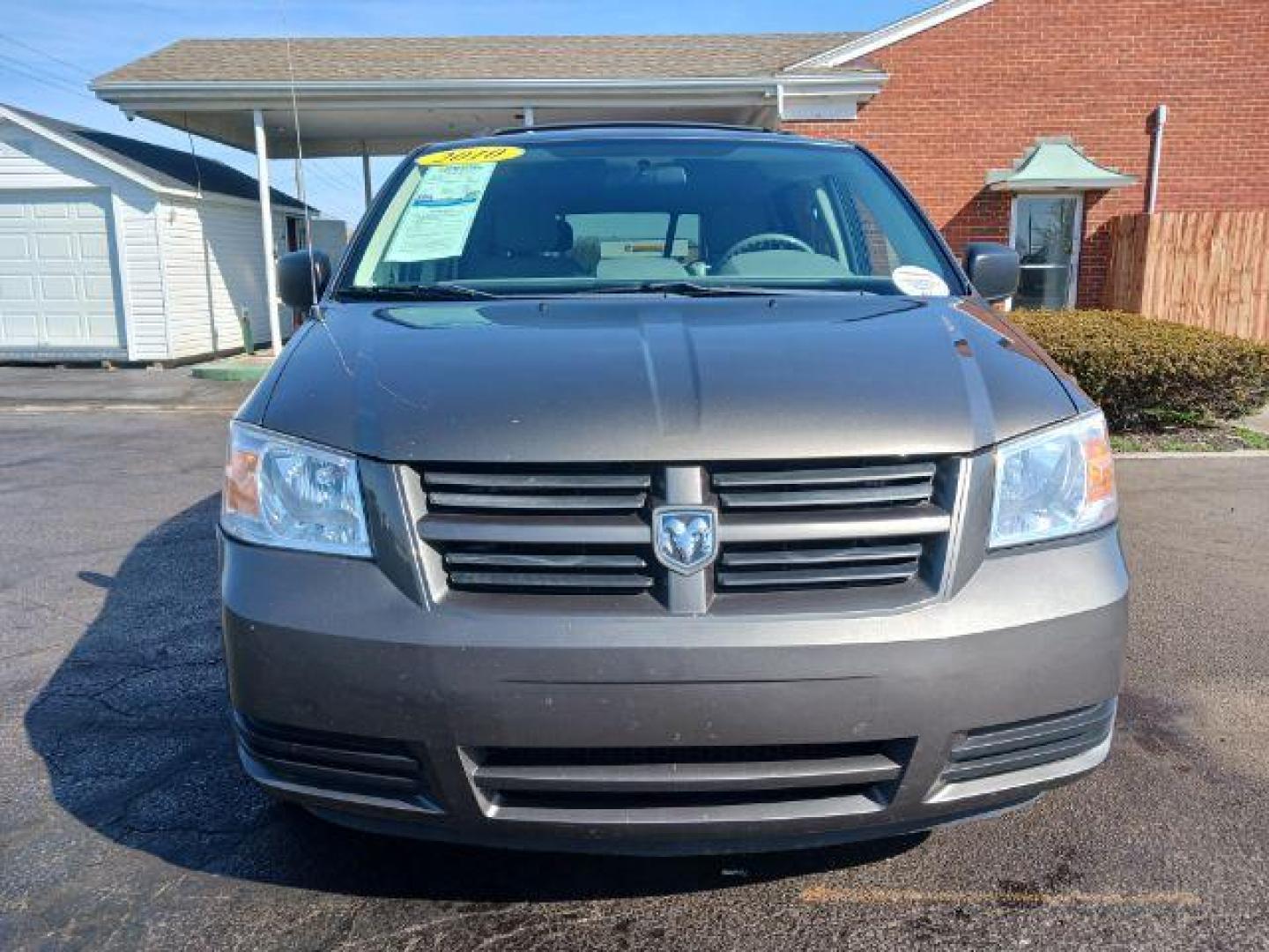 2010 Dark Cordovan Pearl Dodge Grand Caravan Hero (2D4RN3D16AR) with an 3.8L V6 OHV 12V engine, 6-Speed Automatic transmission, located at 4508 South Dixie Dr, Moraine, OH, 45439, (937) 908-9800, 39.689976, -84.218452 - Photo#1