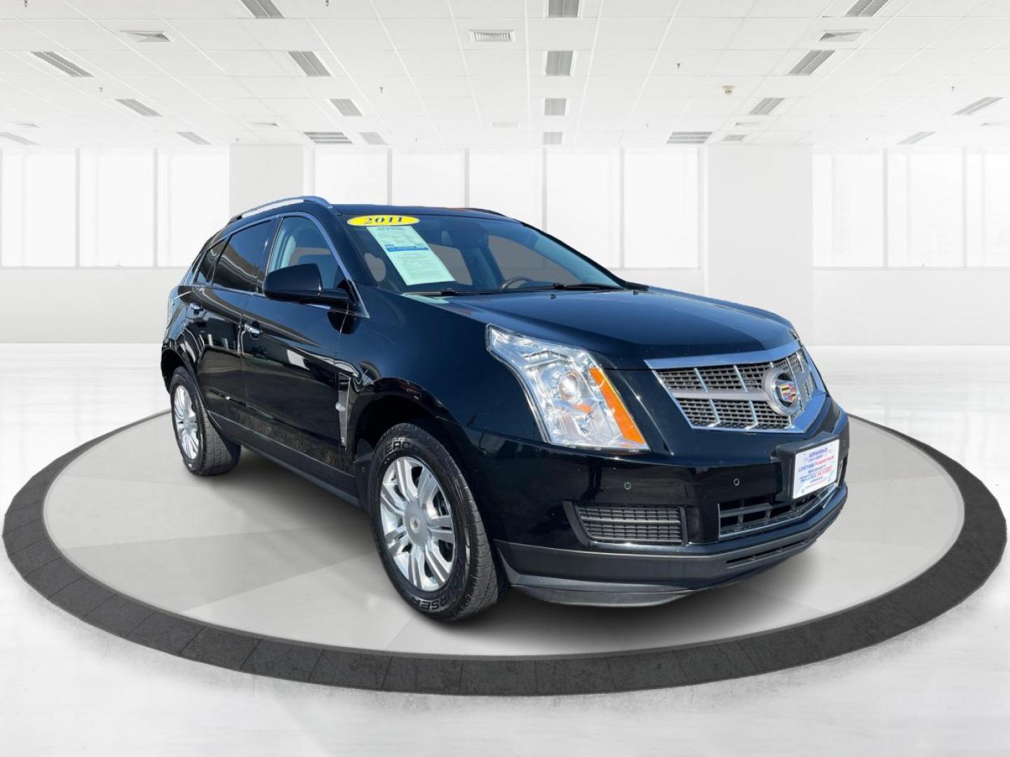 2011 Black Raven Cadillac SRX Luxury Collection (3GYFNAEY6BS) with an 3.0L V6 DOHC 24V engine, 6-Speed Automatic transmission, located at 1951 S Dayton Lakeview Rd., New Carlisle, OH, 45344, (937) 908-9800, 39.890999, -84.050255 - Photo#0