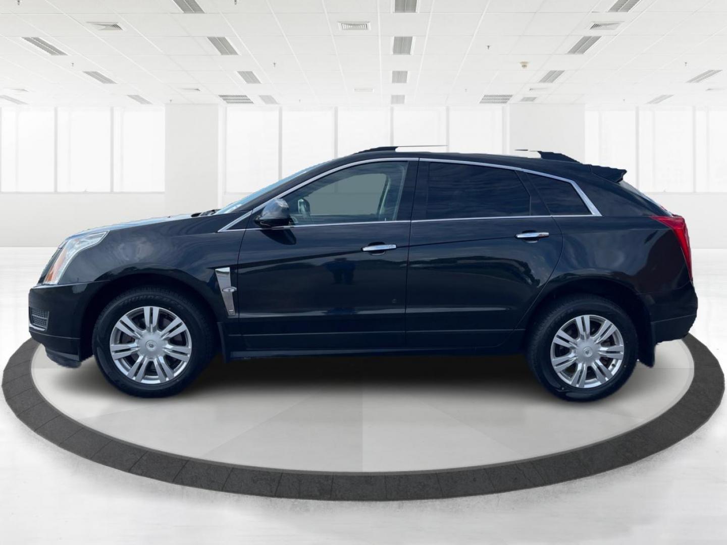 2011 Black Raven Cadillac SRX (3GYFNGEY5BS) with an 3.0L V6 DOHC 24V engine, 6-Speed Automatic transmission, located at 401 Woodman Dr, Riverside, OH, 45431, (937) 908-9800, 39.760899, -84.123421 - Photo#5