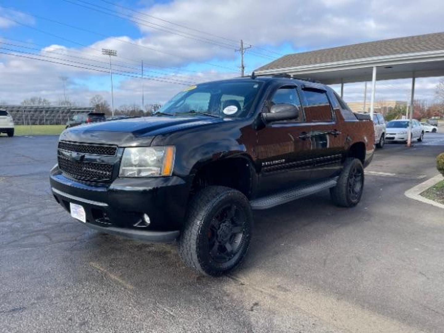 2011 Black Chevrolet Avalanche LTZ 4WD (3GNTKGE30BG) with an 5.3L V8 OHV 16V FFV engine, 4-Speed Automatic transmission, located at 401 Woodman Dr, Riverside, OH, 45431, (937) 908-9800, 39.760899, -84.123421 - Photo#1