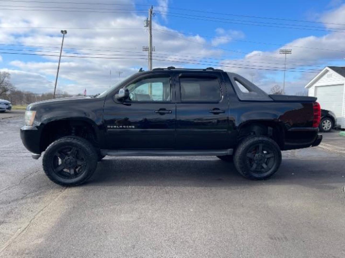 2011 Black Chevrolet Avalanche LTZ 4WD (3GNTKGE30BG) with an 5.3L V8 OHV 16V FFV engine, 4-Speed Automatic transmission, located at 401 Woodman Dr, Riverside, OH, 45431, (937) 908-9800, 39.760899, -84.123421 - Photo#3