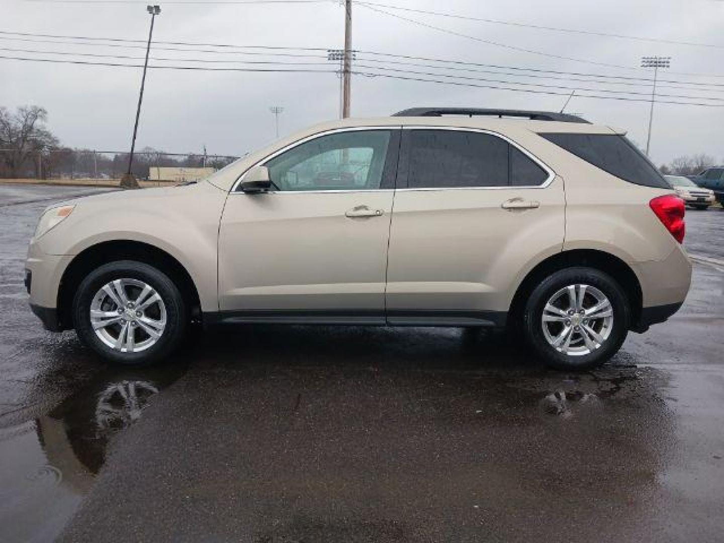 2011 Gold Mist Metallic Chevrolet Equinox 1LT 2WD (2GNALDEC2B1) with an 2.4L L4 DOHC 16V engine, 6-Speed Automatic transmission, located at 1099 N County Rd 25A , Troy, OH, 45373, (937) 908-9800, 40.057079, -84.212883 - Photo#3