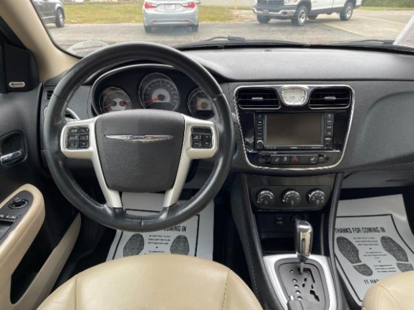 2011 Deep Cherry Red Crystal Pearl Chrysler 200 Limited (1C3BC2FG4BN) with an 3.6L V6 DOHC 24V FFV engine, 6-Speed Automatic transmission, located at 1230 East Main St, Xenia, OH, 45385, (937) 908-9800, 39.688026, -83.910172 - Photo#7