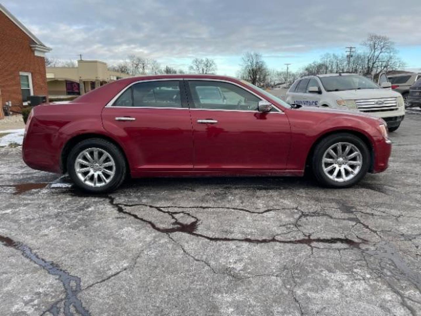 2011 Deep Cherry Red Crystal Pearl Chrysler 300 Limited RWD (2C3CA5CG5BH) with an 3.6L V6 SOHC 24V engine, 5-Speed Automatic transmission, located at 1230 East Main St, Xenia, OH, 45385, (937) 908-9800, 39.688026, -83.910172 - Photo#3