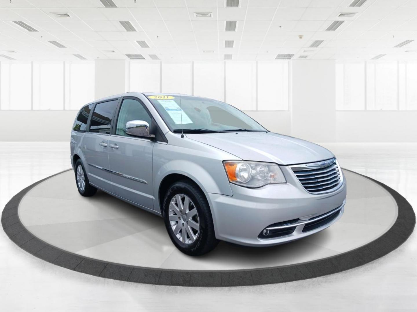 2011 Bright Silver Metallic Chrysler Town and Country Touring-L (2A4RR8DG1BR) with an 3.6L V6 DOHC 24V engine, 6-Speed Automatic transmission, located at 1099 N County Rd 25A , Troy, OH, 45373, (937) 908-9800, 40.057079, -84.212883 - Photo#0