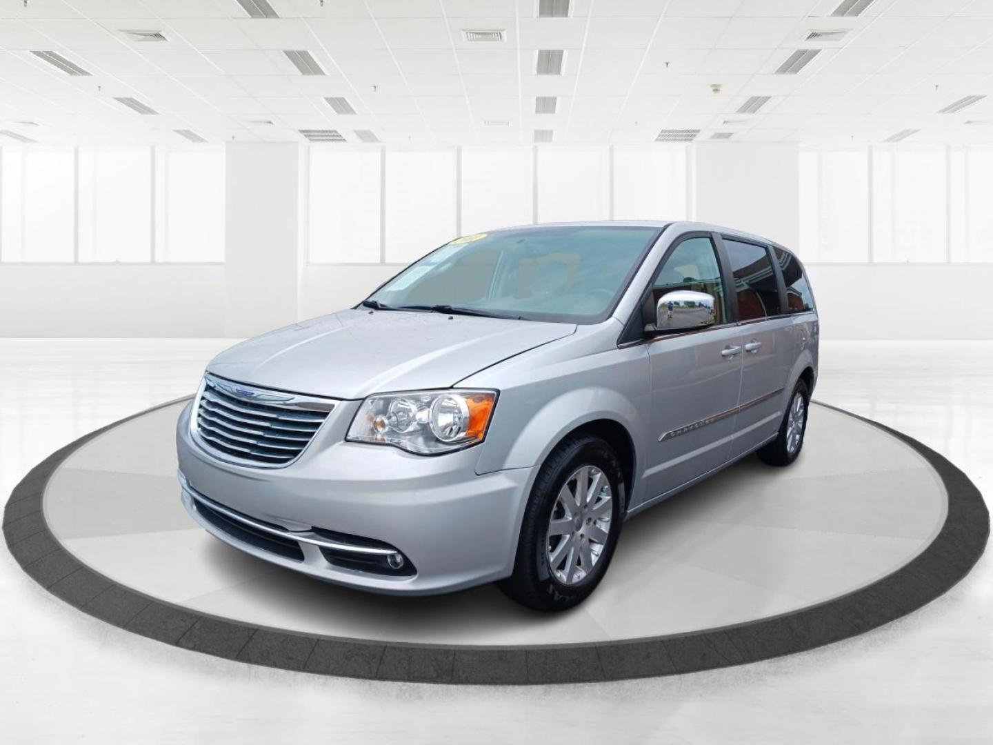 2011 Bright Silver Metallic Chrysler Town and Country Touring-L (2A4RR8DG1BR) with an 3.6L V6 DOHC 24V engine, 6-Speed Automatic transmission, located at 1099 N County Rd 25A , Troy, OH, 45373, (937) 908-9800, 40.057079, -84.212883 - Photo#7