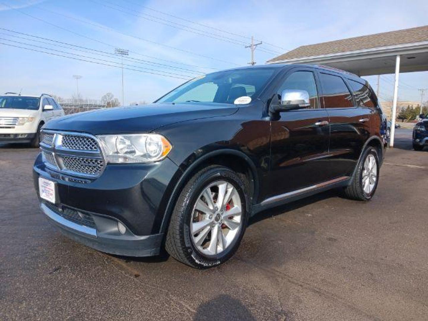 2011 Brilliant Black Crystal Pearl Dodge Durango Crew AWD (1D4SE4GTXBC) with an 5.7L V8 OHV 16V engine, 5-Speed Automatic transmission, located at 1230 East Main St, Xenia, OH, 45385, (937) 908-9800, 39.688026, -83.910172 - Photo#2