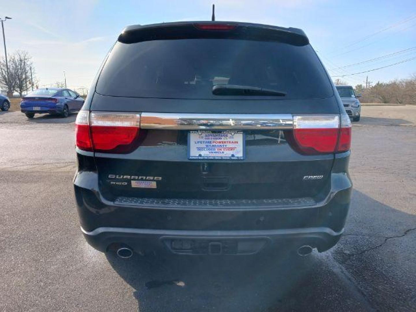 2011 Brilliant Black Crystal Pearl Dodge Durango Crew AWD (1D4SE4GTXBC) with an 5.7L V8 OHV 16V engine, 5-Speed Automatic transmission, located at 1230 East Main St, Xenia, OH, 45385, (937) 908-9800, 39.688026, -83.910172 - Photo#5