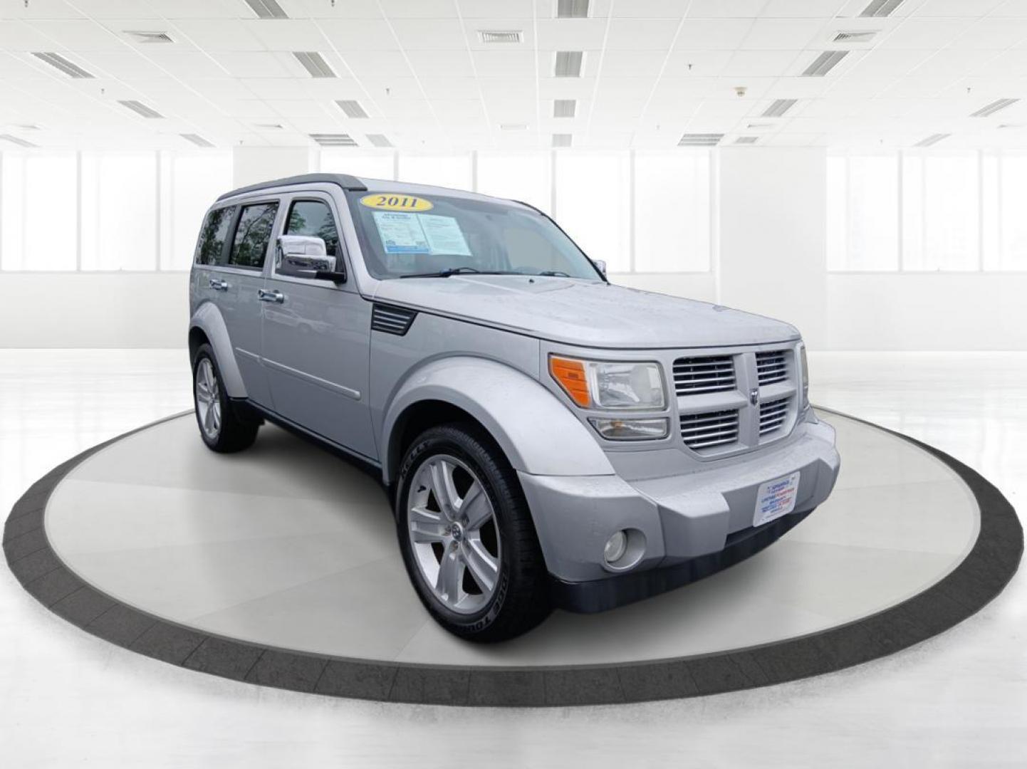 2011 Bright Silver Metallic Dodge Nitro Heat 4WD (1D4PU4GK9BW) with an 3.7L V6 SOHC 12V engine, 4-Speed Automatic transmission, located at 1951 S Dayton Lakeview Rd., New Carlisle, OH, 45344, (937) 908-9800, 39.890999, -84.050255 - Photo#0