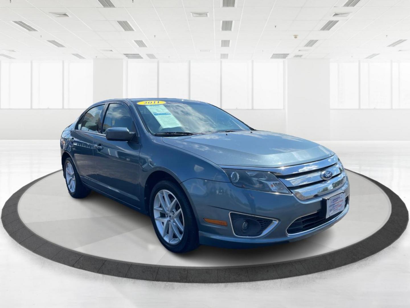 2011 Blue Ford Fusion V6 SEL (3FAHP0JG0BR) with an 3.0L V6 DOHC 24V engine, located at 1184 Kauffman Ave, Fairborn, OH, 45324, (937) 908-9800, 39.807072, -84.030914 - Photo#0