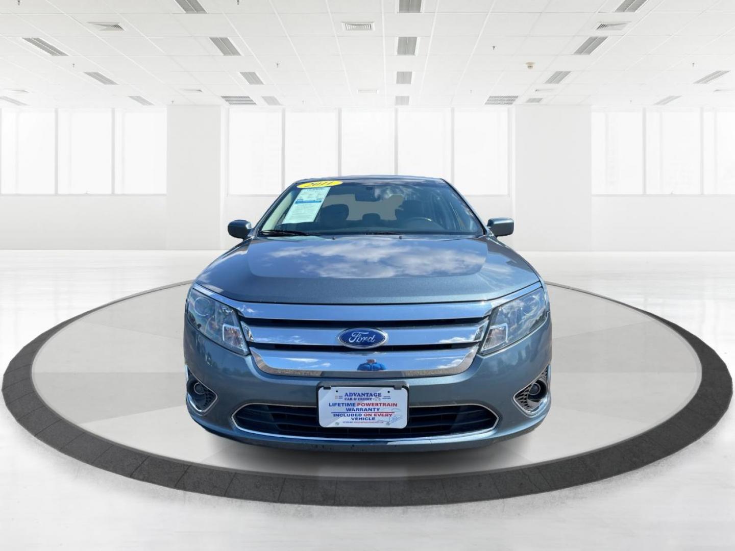 2011 Blue Ford Fusion V6 SEL (3FAHP0JG0BR) with an 3.0L V6 DOHC 24V engine, located at 1184 Kauffman Ave, Fairborn, OH, 45324, (937) 908-9800, 39.807072, -84.030914 - Photo#6