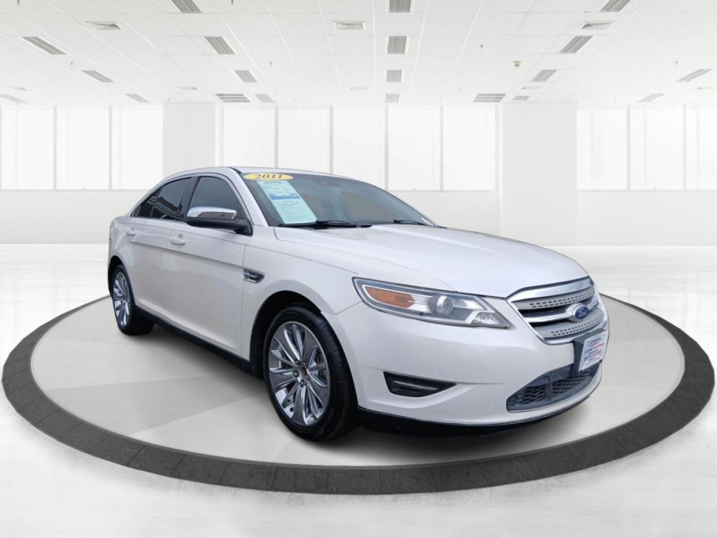 2011 White Platinum Metallic Ford Taurus Limited FWD (1FAHP2FW9BG) with an 3.5L V6 DOHC 24V engine, 6-Speed Automatic transmission, located at 1951 S Dayton Lakeview Rd., New Carlisle, OH, 45344, (937) 908-9800, 39.890999, -84.050255 - Photo#0