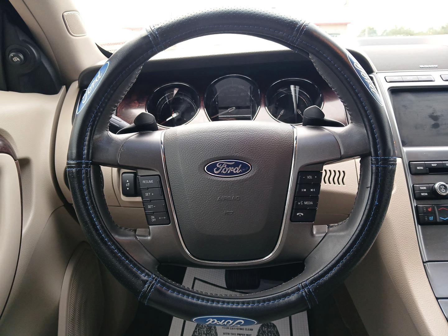 2011 White Platinum Metallic Ford Taurus Limited FWD (1FAHP2FW9BG) with an 3.5L V6 DOHC 24V engine, 6-Speed Automatic transmission, located at 1951 S Dayton Lakeview Rd., New Carlisle, OH, 45344, (937) 908-9800, 39.890999, -84.050255 - Photo#15