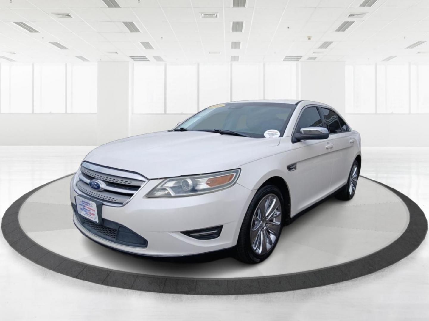 2011 White Platinum Metallic Ford Taurus Limited FWD (1FAHP2FW9BG) with an 3.5L V6 DOHC 24V engine, 6-Speed Automatic transmission, located at 1951 S Dayton Lakeview Rd., New Carlisle, OH, 45344, (937) 908-9800, 39.890999, -84.050255 - Photo#7