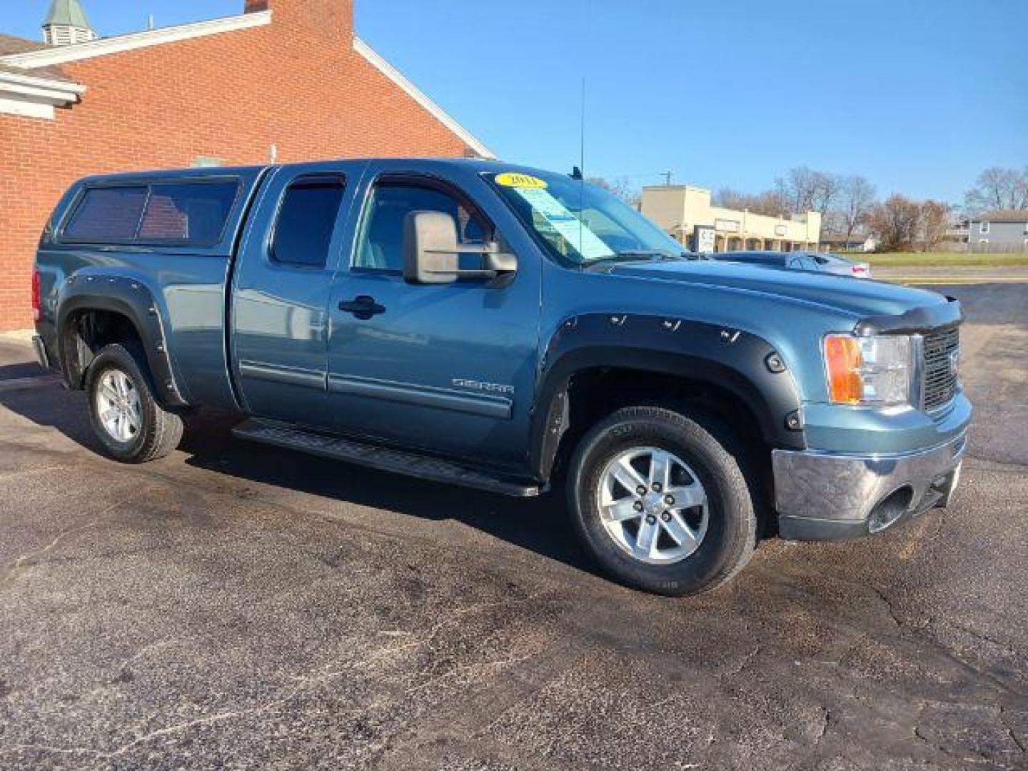 2011 Midnight Blue Metallic GMC Sierra 1500 SLE Ext. Cab 4WD (1GTR2VE32BZ) with an 5.3L V8 OHV 16V FFV engine, 6-Speed Automatic transmission, located at 1184 Kauffman Ave, Fairborn, OH, 45324, (937) 908-9800, 39.807072, -84.030914 - Photo#0