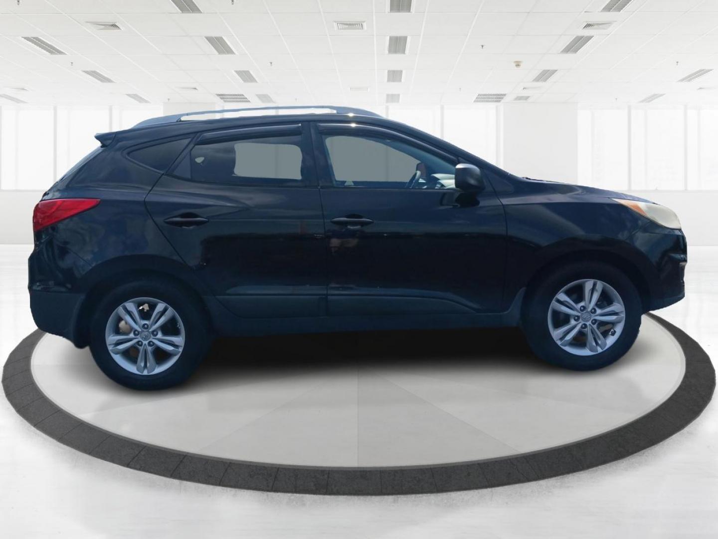 2011 Ash Black Mica Hyundai Tucson (KM8JU3AC8BU) with an 2.4L L4 DOHC 16V engine, 6-Speed Automatic transmission, located at 1099 N County Rd 25A , Troy, OH, 45373, (937) 908-9800, 40.057079, -84.212883 - Photo#1