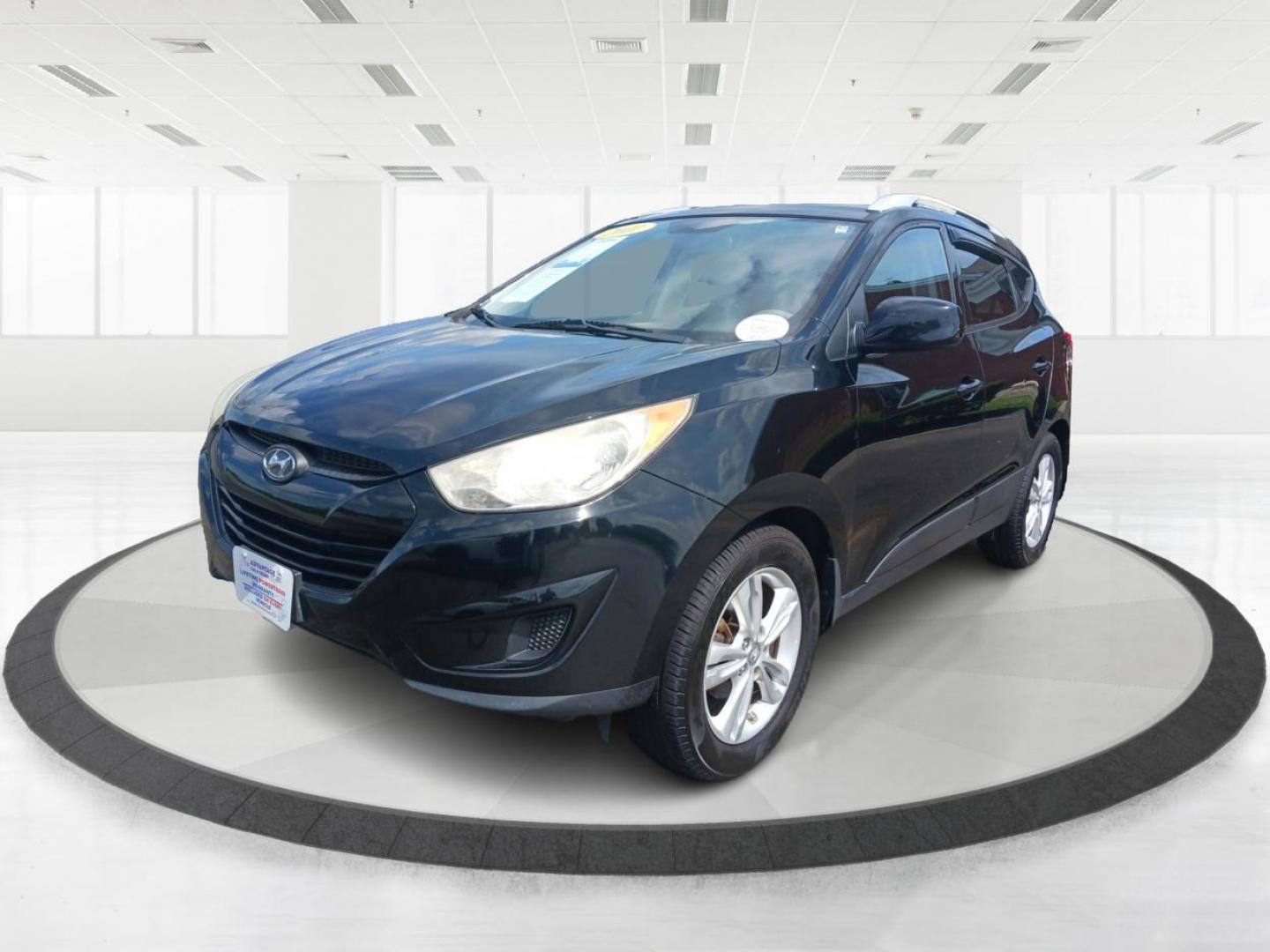 2011 Ash Black Mica Hyundai Tucson (KM8JU3AC8BU) with an 2.4L L4 DOHC 16V engine, 6-Speed Automatic transmission, located at 1099 N County Rd 25A , Troy, OH, 45373, (937) 908-9800, 40.057079, -84.212883 - Photo#5