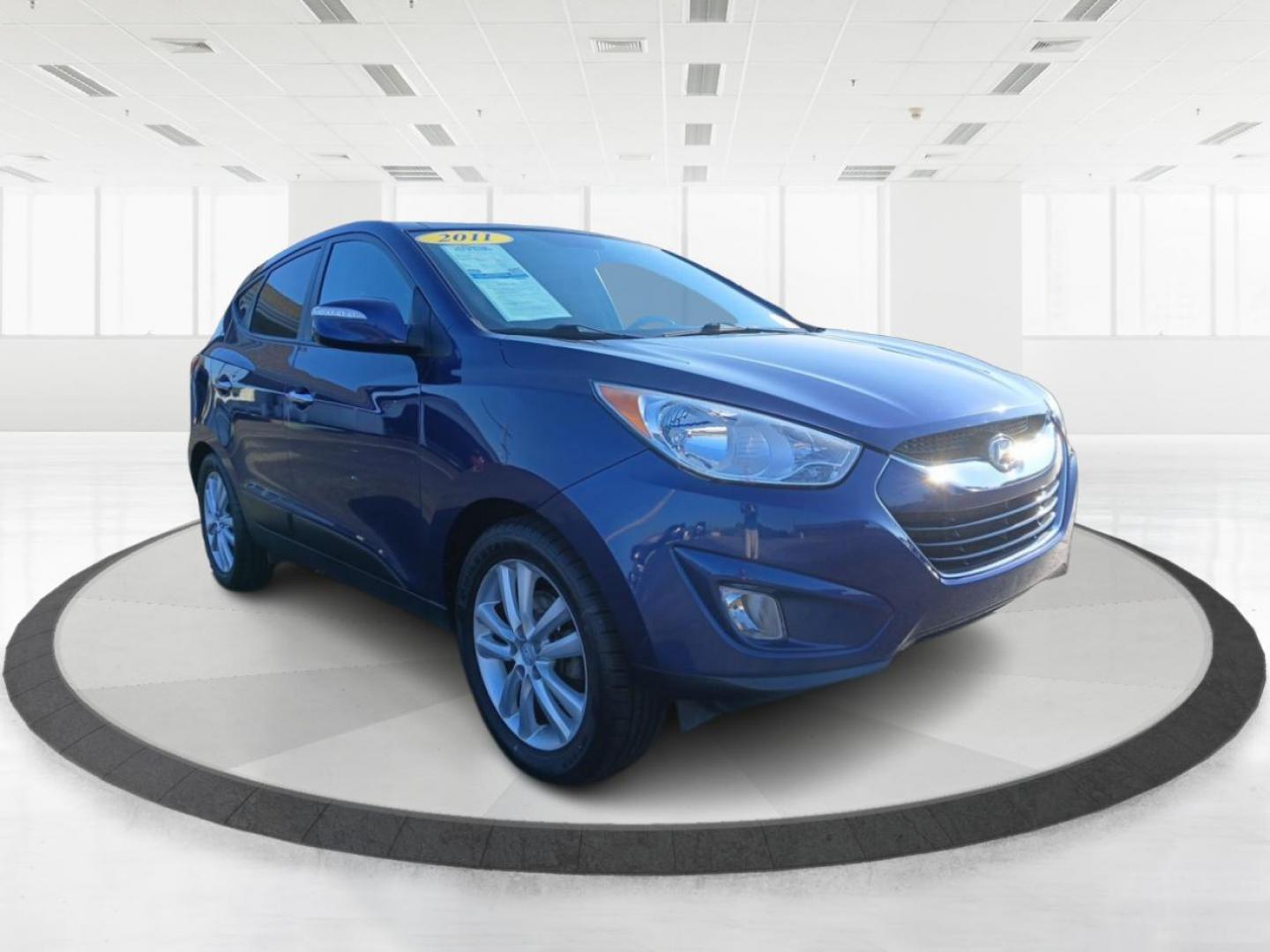 2011 Aurora Blue Metallic Hyundai Tucson (KM8JUCAC1BU) with an 2.4L L4 DOHC 16V engine, 6-Speed Automatic transmission, located at 1230 East Main St, Xenia, OH, 45385, (937) 908-9800, 39.688026, -83.910172 - Photo#0