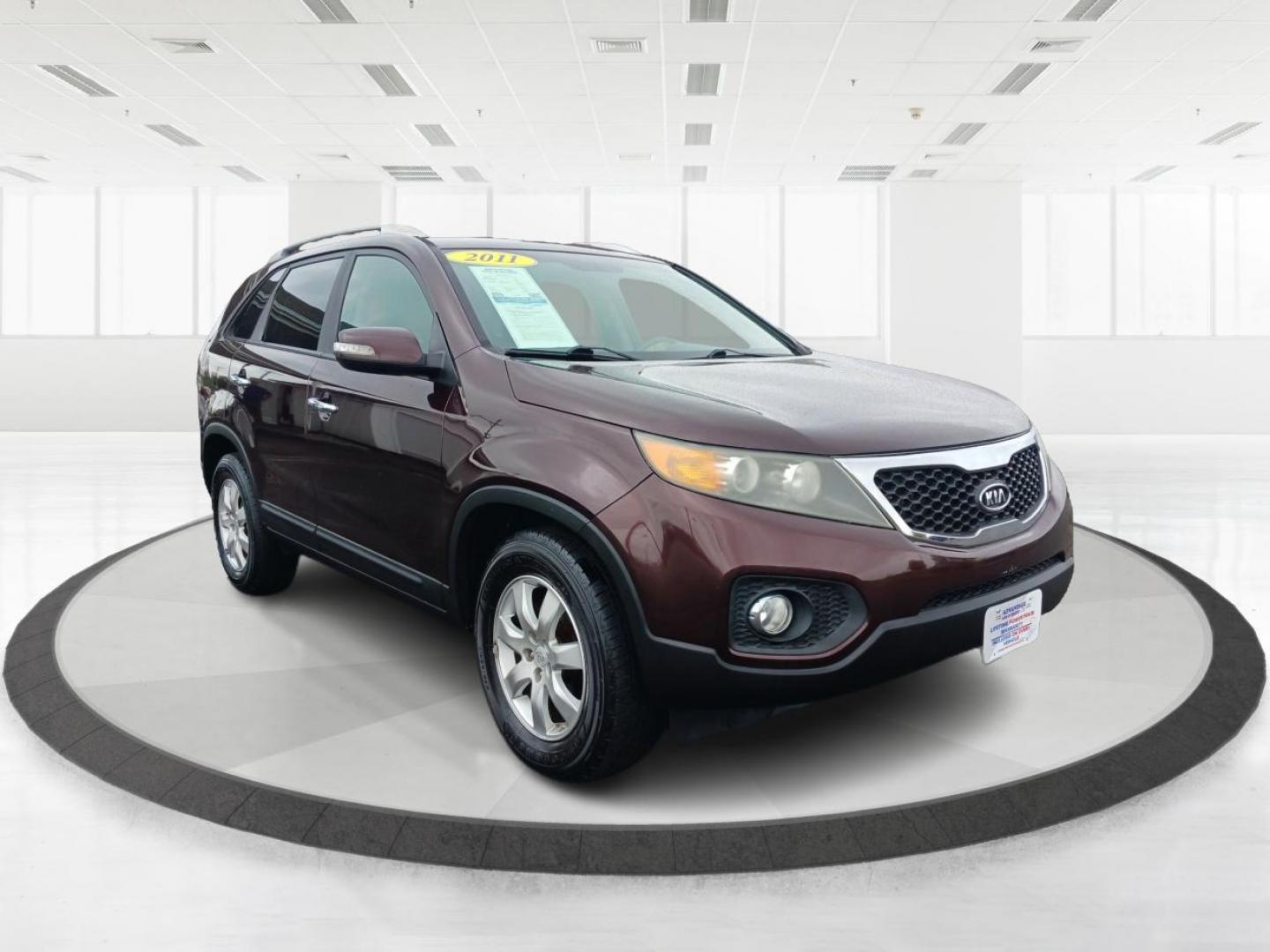 2011 Dark Cherry Kia Sorento LX 2WD (5XYKT3A14BG) with an 2.4L L4 DOHC 16V engine, 6-Speed Automatic transmission, located at 4508 South Dixie Dr, Moraine, OH, 45439, (937) 908-9800, 39.689976, -84.218452 - Photo#0