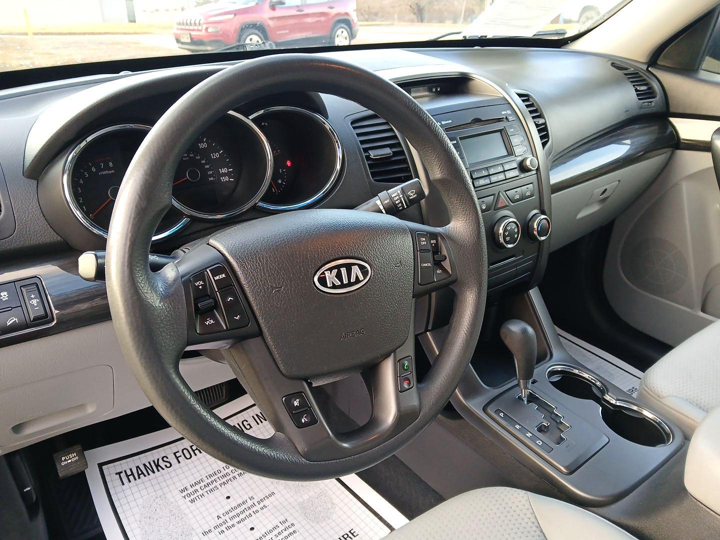 2011 Kia Sorento LX 2WD (5XYKT3A18BG) with an 2.4L L4 DOHC 16V engine, 6-Speed Automatic transmission, located at 1099 N County Rd 25A , Troy, OH, 45373, (937) 908-9800, 40.057079, -84.212883 - 2011 Kia Sorento LX 2WD - Photo#8