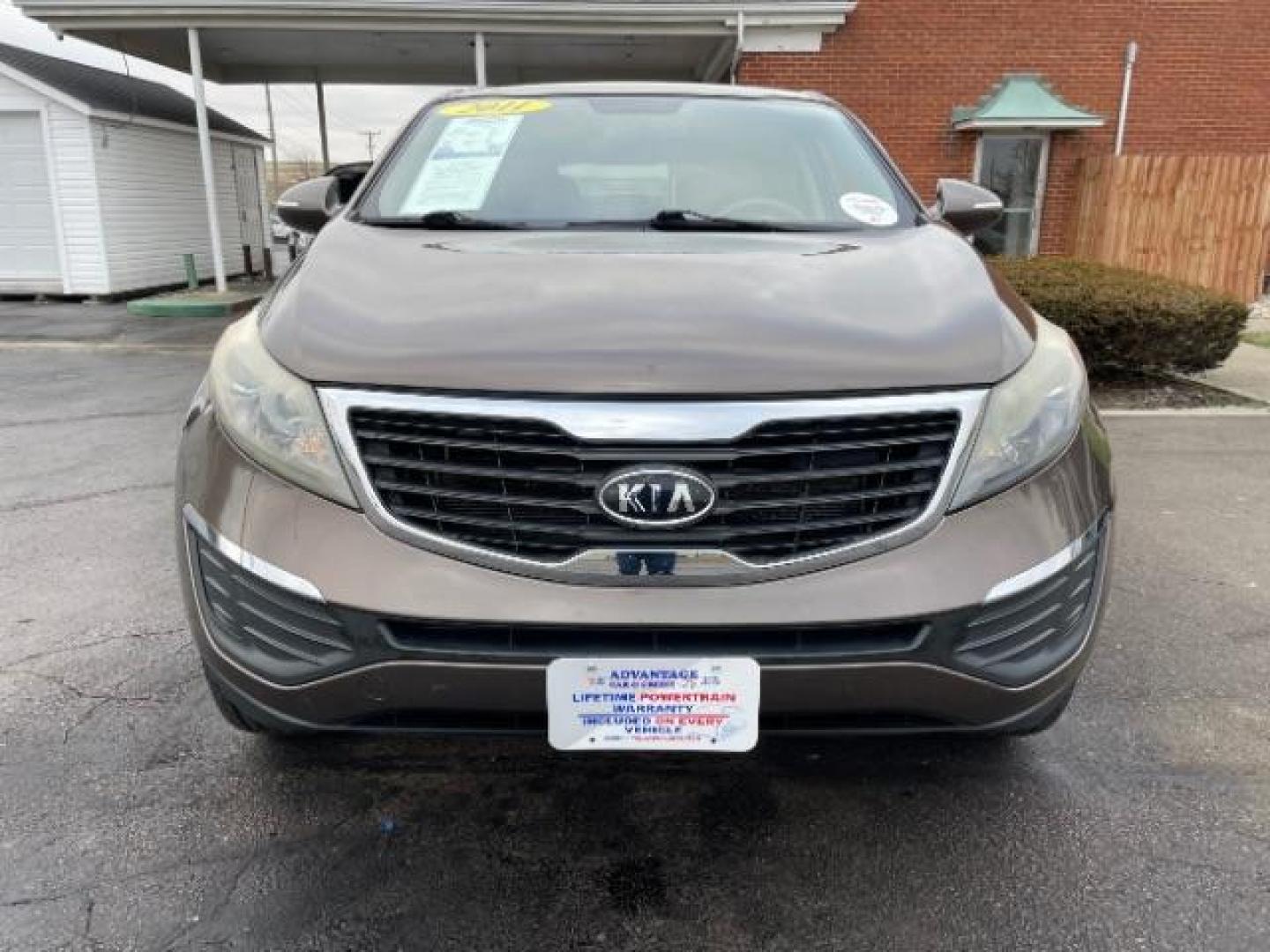 2011 Sand Track Kia Sportage LX FWD (KNDPB3A29B7) with an 2.4L V6 DOHC 24V engine, 6-Speed Automatic transmission, located at 401 Woodman Dr, Riverside, OH, 45431, (937) 908-9800, 39.760899, -84.123421 - Photo#2