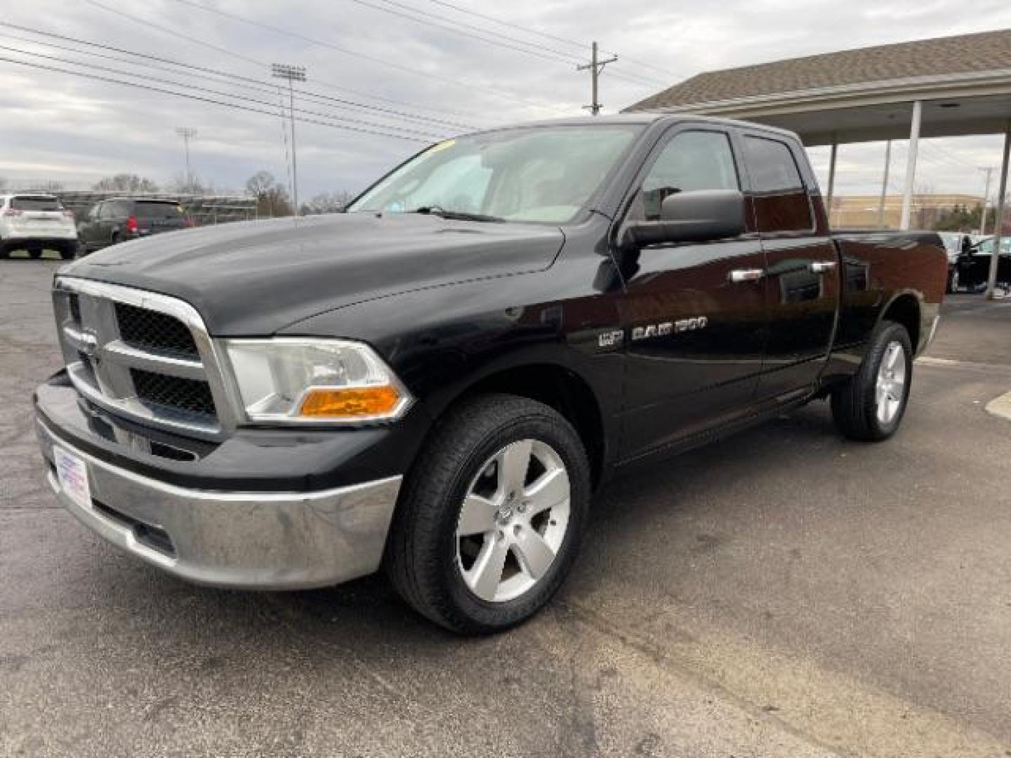 2011 Brilliant Black Crystal Pearl RAM 1500 ST Quad Cab 4WD (1D7RV1GT0BS) with an 5.7L V8 OHV 16V engine, 5-Speed Automatic transmission, located at 1230 East Main St, Xenia, OH, 45385, (937) 908-9800, 39.688026, -83.910172 - Photo#1