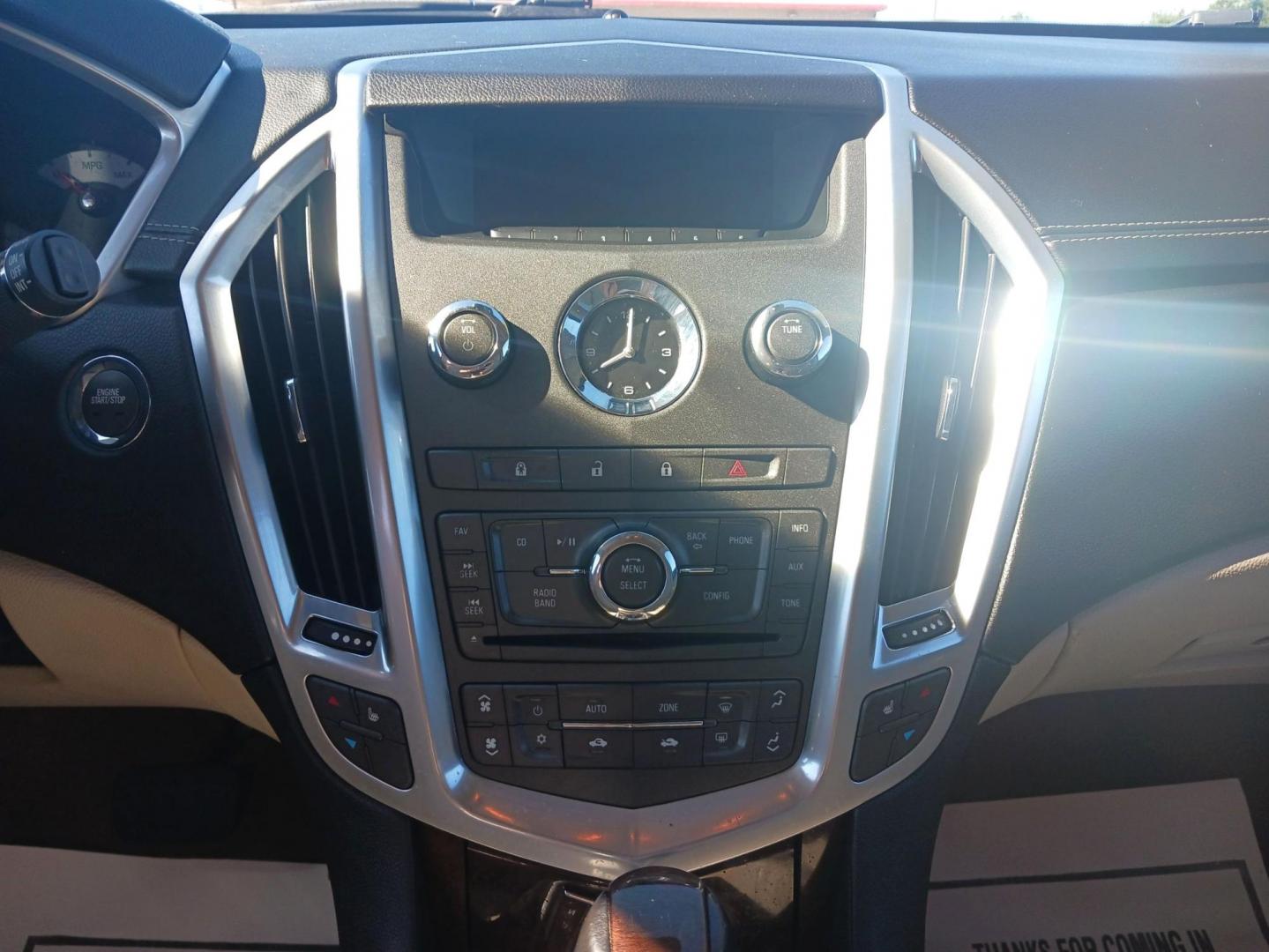 2012 White Cadillac SRX (3GYFNDE38CS) with an 3.6L V6 DOHC 24V FFV engine, 6-Speed Automatic transmission, located at 880 E. National Road, Vandalia, OH, 45377, (937) 908-9800, 39.891918, -84.183594 - Photo#12