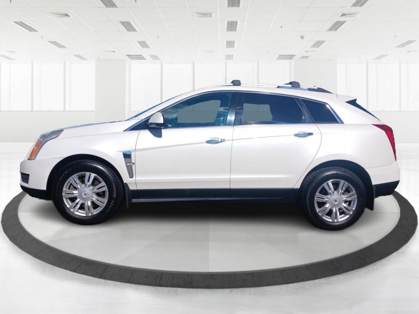 2012 White Cadillac SRX (3GYFNDE38CS) with an 3.6L V6 DOHC 24V FFV engine, 6-Speed Automatic transmission, located at 880 E. National Road, Vandalia, OH, 45377, (937) 908-9800, 39.891918, -84.183594 - Photo#5