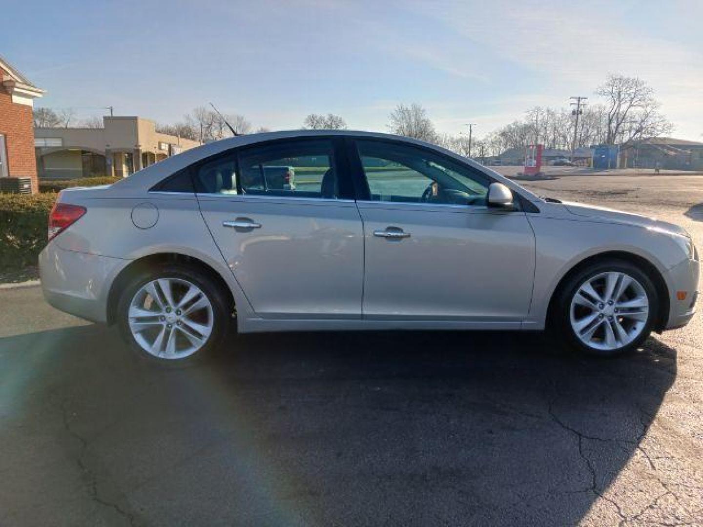 2012 Gold Mist Metallic Chevrolet Cruze LTZ (1G1PH5SC3C7) with an 1.4L L4 DOHC 16V TURBO engine, 6-Speed Automatic transmission, located at 4508 South Dixie Dr, Moraine, OH, 45439, (937) 908-9800, 39.689976, -84.218452 - Photo#4