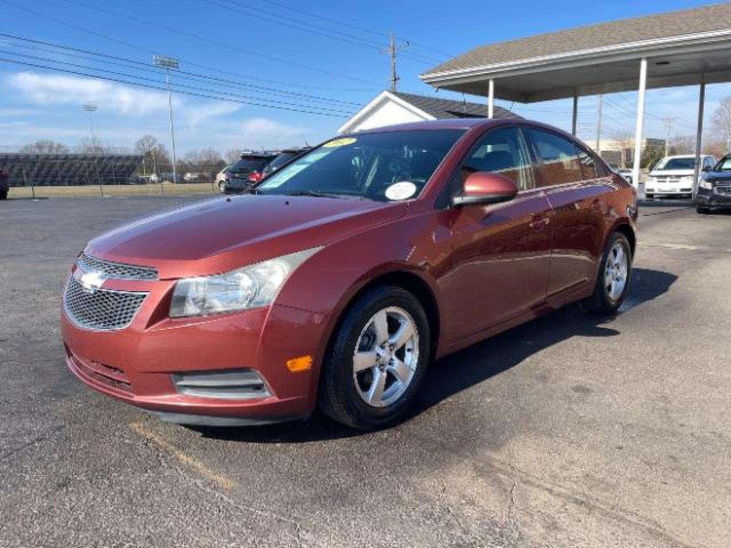 2012 Orange Chevrolet Cruze 1LT (1G1PF5SC6C7) with an 1.4L L4 DOHC 16V TURBO engine, 6-Speed Automatic transmission, located at 4508 South Dixie Dr, Moraine, OH, 45439, (937) 908-9800, 39.689976, -84.218452 - Photo#1