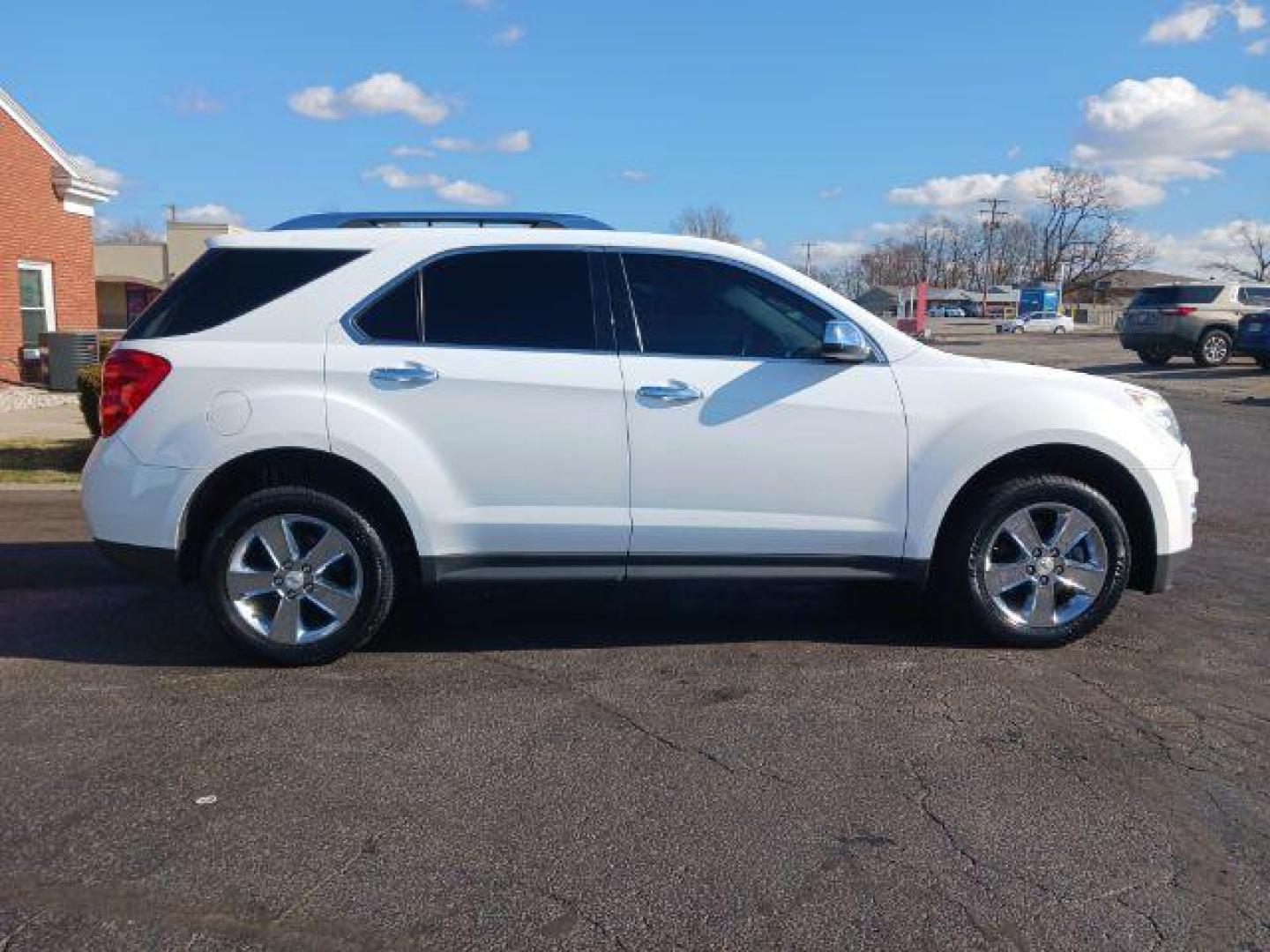 2012 Summit White Chevrolet Equinox LTZ 2WD (2GNALFEK9C6) with an 2.4L L4 DOHC 16V engine, 6-Speed Automatic transmission, located at 401 Woodman Dr, Riverside, OH, 45431, (937) 908-9800, 39.760899, -84.123421 - Photo#4