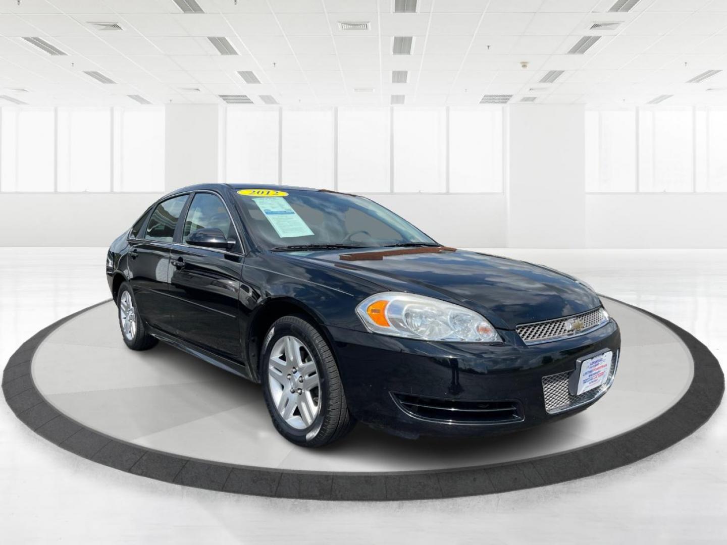 2012 Black Chevrolet Impala LT (2G1WB5E33C1) with an 3.6L V6 DOHC 16V FFV engine, 6-Speed Automatic transmission, located at 1099 N County Rd 25A , Troy, OH, 45373, (937) 908-9800, 40.057079, -84.212883 - Photo#0