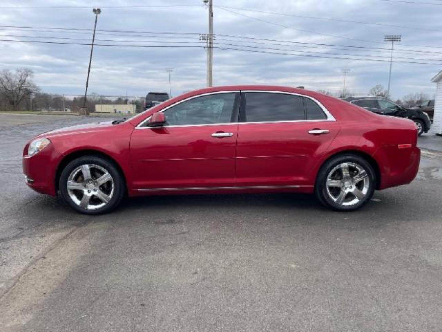 2012 Red Chevrolet Malibu 1LT (1G1ZC5E0XCF) with an 2.4L L4 DOHC 16V engine, 6-Speed Automatic transmission, located at 401 Woodman Dr, Riverside, OH, 45431, (937) 908-9800, 39.760899, -84.123421 - Photo#2