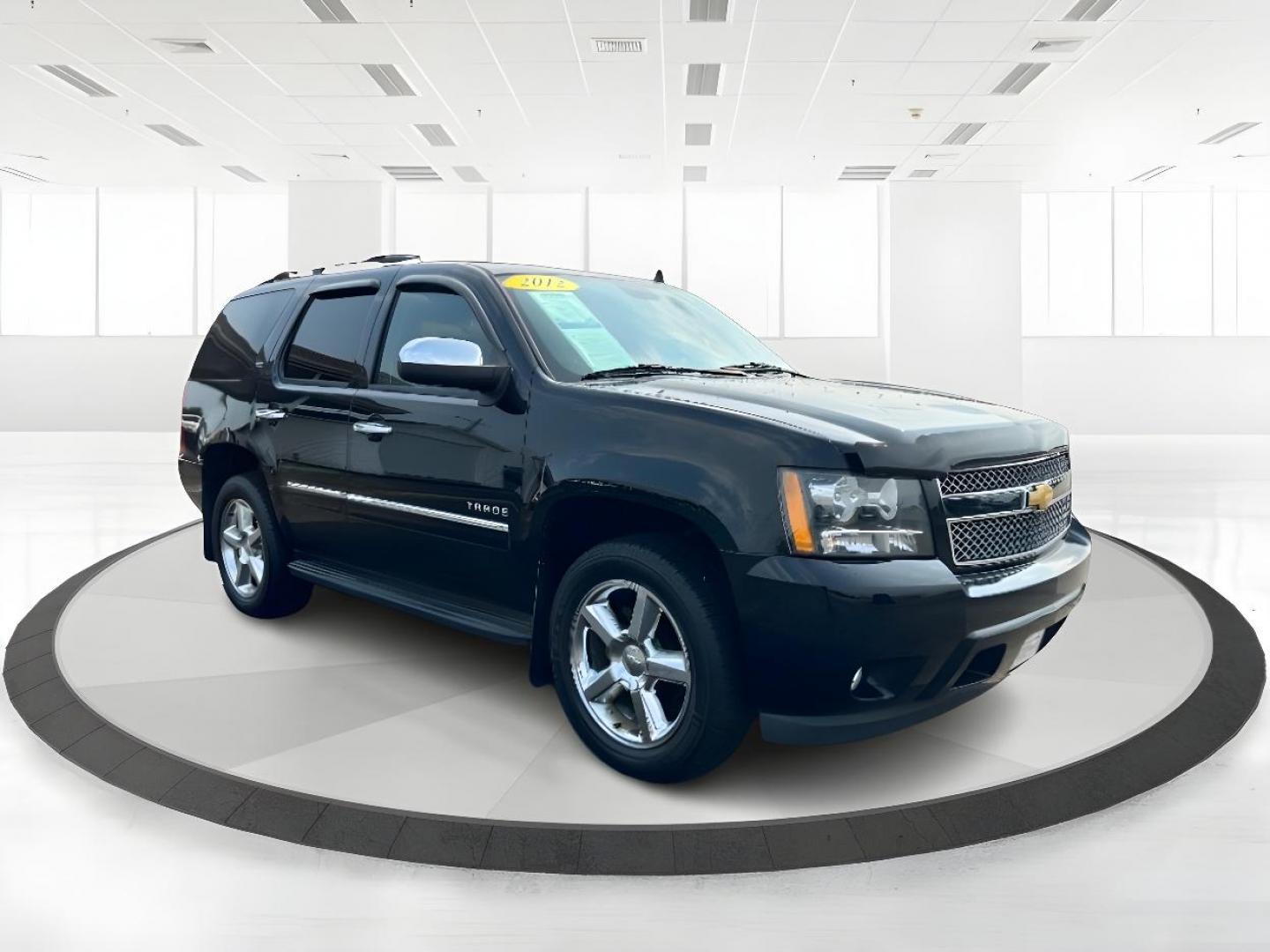 2012 Black Chevrolet Tahoe LTZ 4WD (1GNSKCE00CR) with an 5.3L V8 OHV 16V FFV engine, 6-Speed Automatic transmission, located at 401 Woodman Dr, Riverside, OH, 45431, (937) 908-9800, 39.760899, -84.123421 - Photo#0