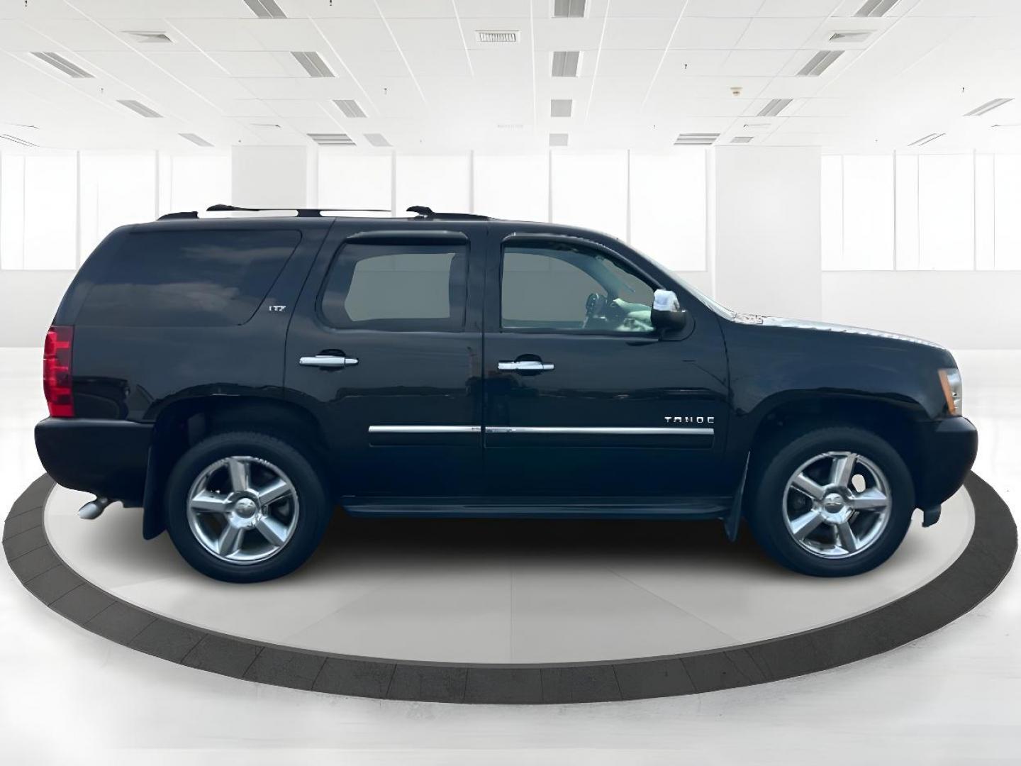 2012 Black Chevrolet Tahoe (1GNSKCE00CR) with an 5.3L V8 OHV 16V FFV engine, 6-Speed Automatic transmission, located at 401 Woodman Dr, Riverside, OH, 45431, (937) 908-9800, 39.760899, -84.123421 - Photo#1