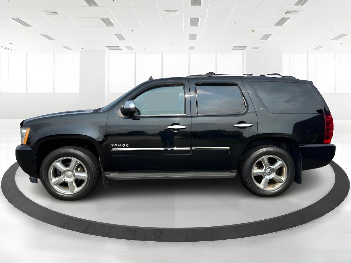 2012 Black Chevrolet Tahoe LTZ 4WD (1GNSKCE00CR) with an 5.3L V8 OHV 16V FFV engine, 6-Speed Automatic transmission, located at 401 Woodman Dr, Riverside, OH, 45431, (937) 908-9800, 39.760899, -84.123421 - Photo#3