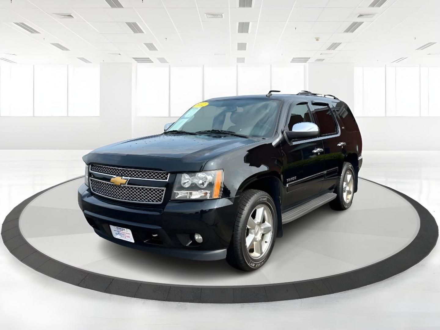 2012 Black Chevrolet Tahoe LTZ 4WD (1GNSKCE00CR) with an 5.3L V8 OHV 16V FFV engine, 6-Speed Automatic transmission, located at 401 Woodman Dr, Riverside, OH, 45431, (937) 908-9800, 39.760899, -84.123421 - Photo#5