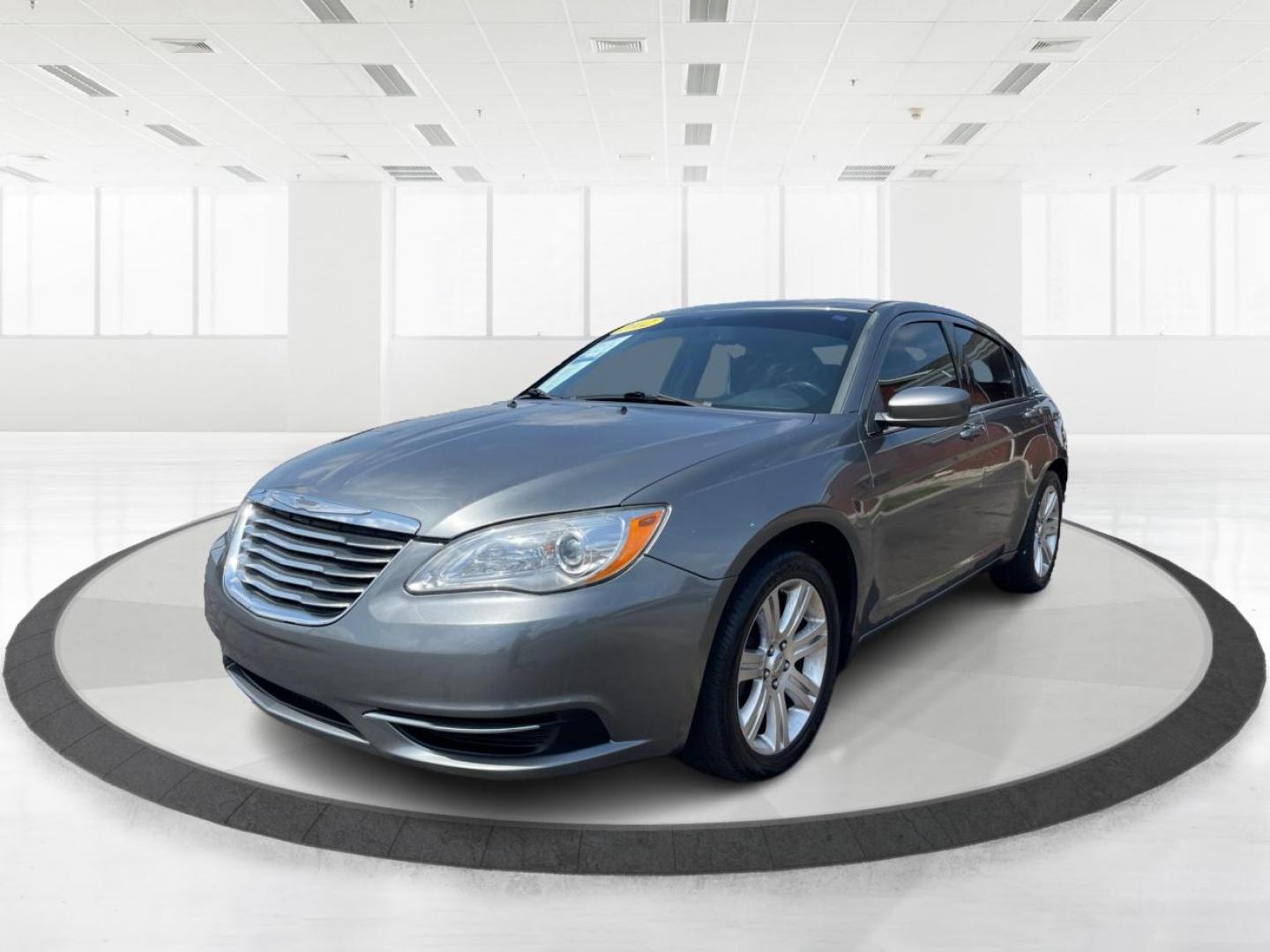 2012 Tungsten Metallic Chrysler 200 Touring (1C3CCBBB1CN) with an 2.4L L4 DOHC 16V engine, 6-Speed Automatic transmission, located at 880 E. National Road, Vandalia, OH, 45377, (937) 908-9800, 39.891918, -84.183594 - Photo#7