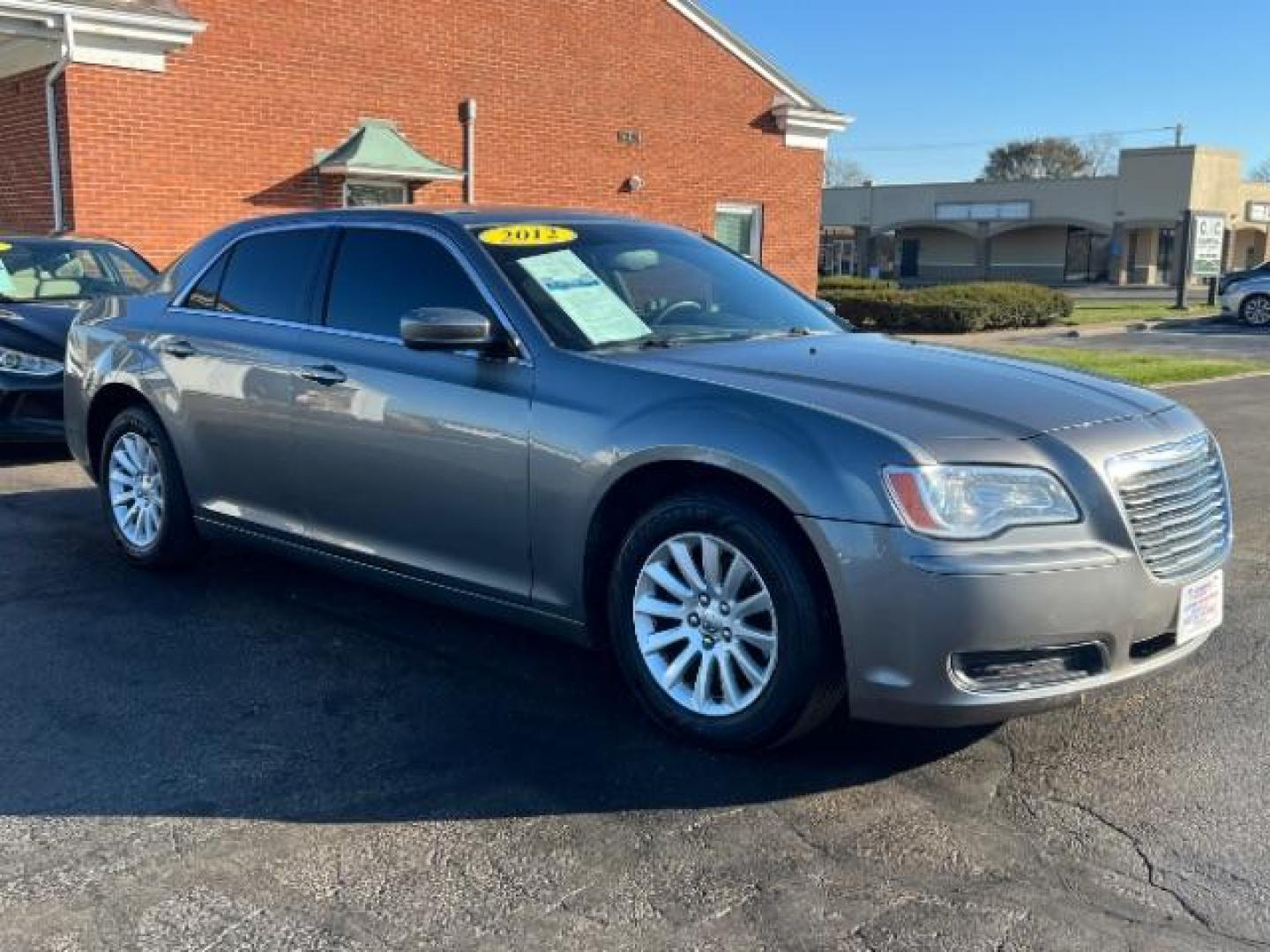 2012 Tungsten Metallic Chrysler 300 Base (2C3CCAAG9CH) with an 3.6L V6 SOHC 24V engine, 5-Speed Automatic transmission, located at 4508 South Dixie Dr, Moraine, OH, 45439, (937) 908-9800, 39.689976, -84.218452 - Photo#0