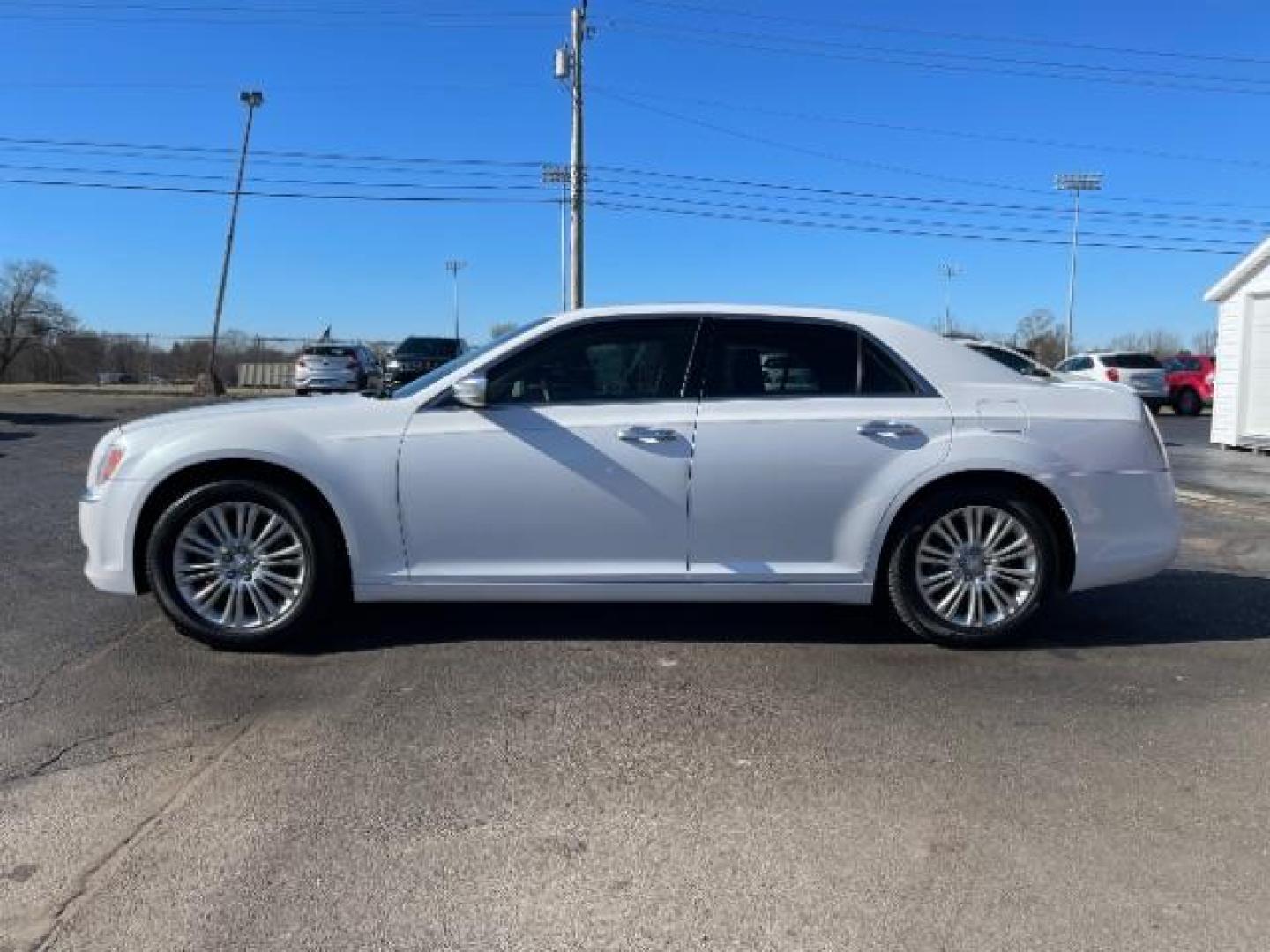 2012 Bright White Chrysler 300 C AWD (2C3CCAST7CH) with an 5.7L V8 OHV 16V engine, 5-Speed Automatic transmission, located at 1951 S Dayton Lakeview Rd., New Carlisle, OH, 45344, (937) 908-9800, 39.890999, -84.050255 - Photo#2