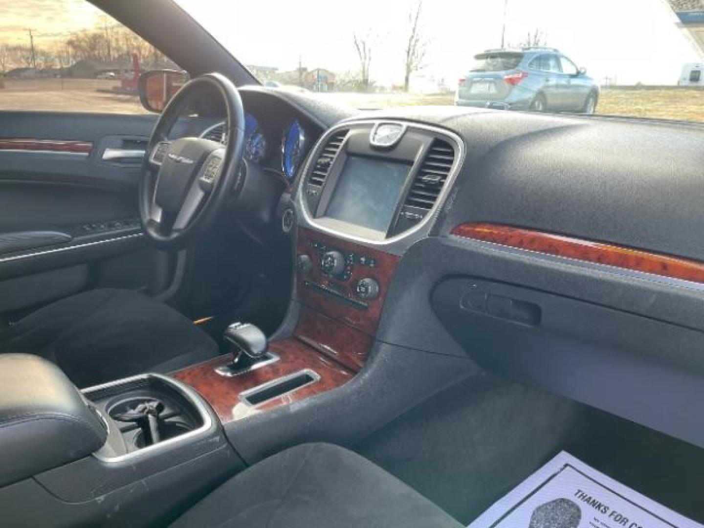 2012 Gloss Black Chrysler 300 Base (2C3CCAAG2CH) with an 3.6L V6 SOHC 24V engine, 5-Speed Automatic transmission, located at 401 Woodman Dr, Riverside, OH, 45431, (937) 908-9800, 39.760899, -84.123421 - Photo#8