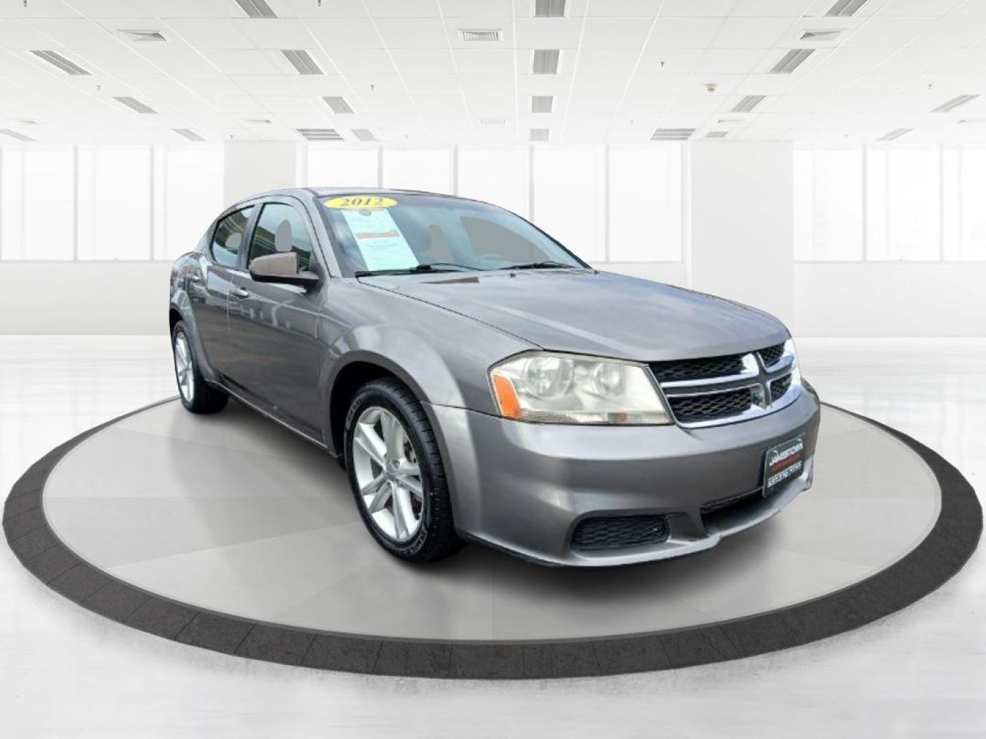 2012 Bright Silver Metallic Dodge Avenger SE (1C3CDZAG6CN) with an 3.6L V6 DOHC 24V FFV engine, 6-Speed Automatic transmission, located at 880 E. National Road, Vandalia, OH, 45377, (937) 908-9800, 39.891918, -84.183594 - Photo#0