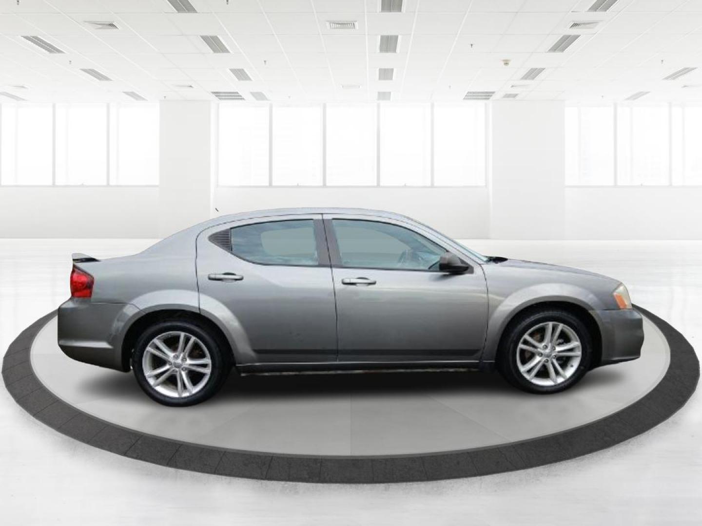 2012 Bright Silver Metallic Dodge Avenger SE (1C3CDZAG6CN) with an 3.6L V6 DOHC 24V FFV engine, 6-Speed Automatic transmission, located at 880 E. National Road, Vandalia, OH, 45377, (937) 908-9800, 39.891918, -84.183594 - Photo#1