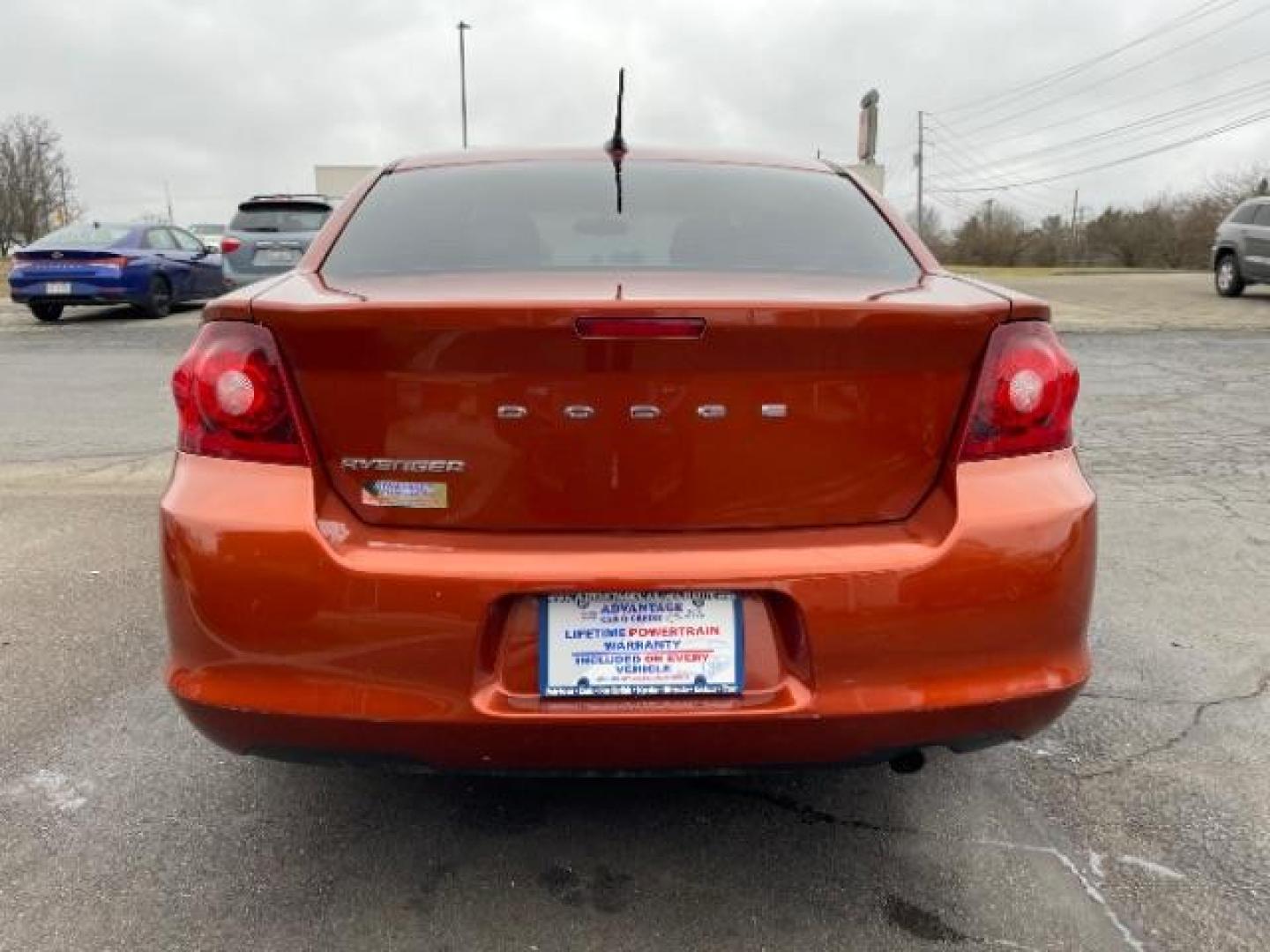 2012 Orange Dodge Avenger Base (1C3CDZAB1CN) with an 2.4L L4 DOHC 16V engine, 4-Speed Automatic transmission, located at 4508 South Dixie Dr, Moraine, OH, 45439, (937) 908-9800, 39.689976, -84.218452 - Photo#4